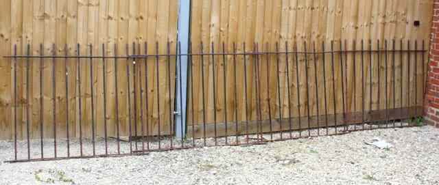 Appraisal: FOUR SECTIONS OF VICTORIAN WROUGHT IRON FENCING of equally interspersed