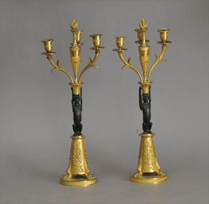 Appraisal: Pair of Empire-Style Patinated and Gilt-Metal Three-Light Candelabra One missing