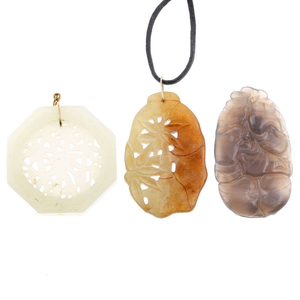 Appraisal: A Trio of Pendants in Jade Lavender Jade Lavender jade