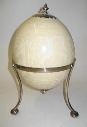 Appraisal: AN OSTRICH EGG early th century carved in low relief