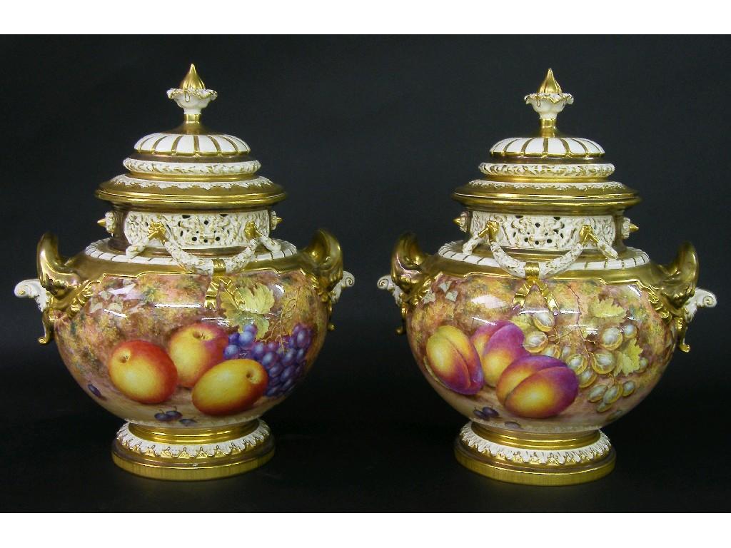 Appraisal: Fine and impressive pair of Royal Worcester twin handled urns