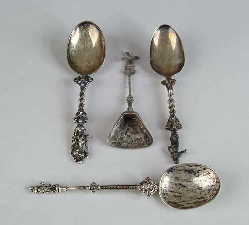 Appraisal: FIVE FANCY CONTINENTAL SPOONS Three silver spoons having figural finials