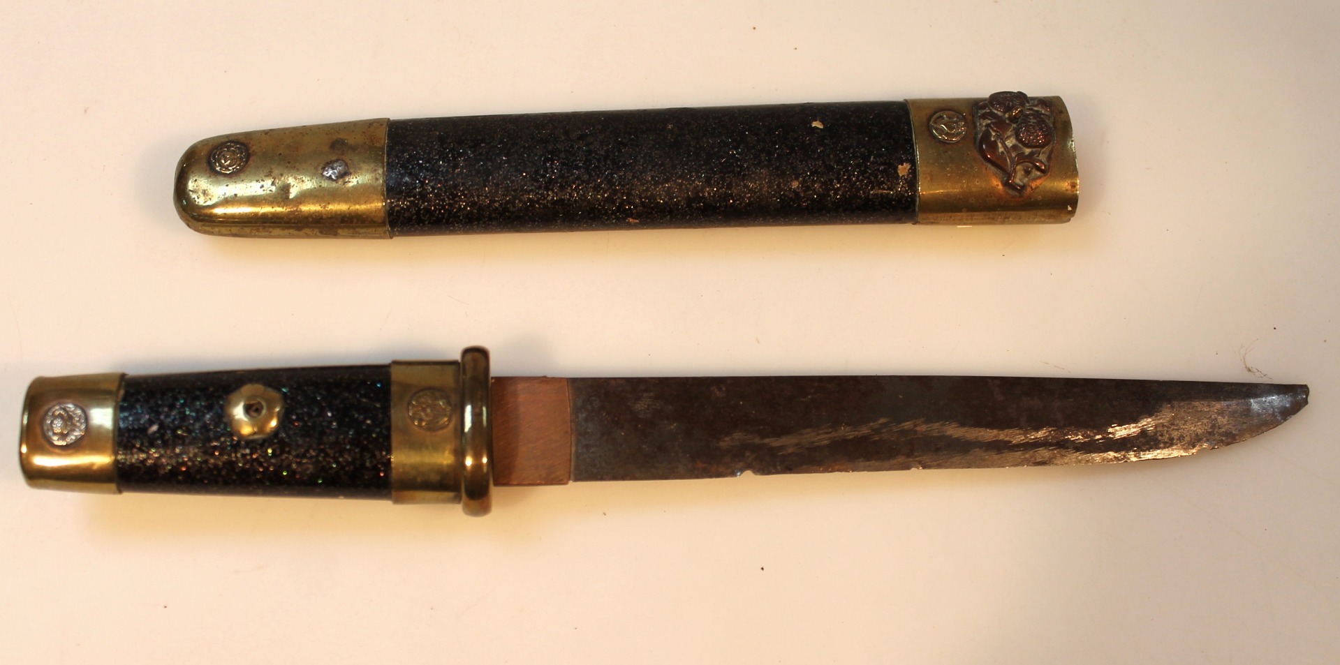 Appraisal: An early thC Taisho period Japanese dagger the straight plain