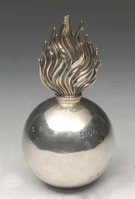 Appraisal: A SILVER CIGAR LIGHTER in the form of a flaming