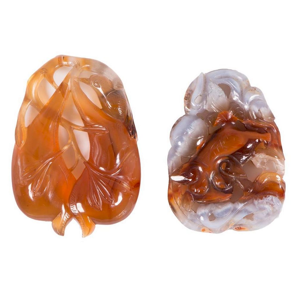 Appraisal: Two Chinese agate pendants Two th century Chinese carved agate