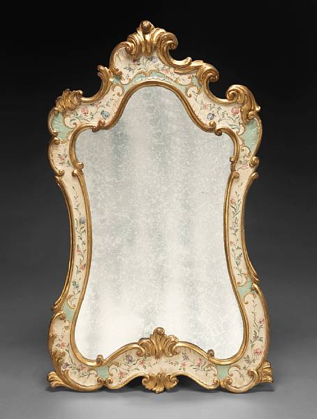 Appraisal: A Venetian Rococo style parcel gilt and paint decorated mirror