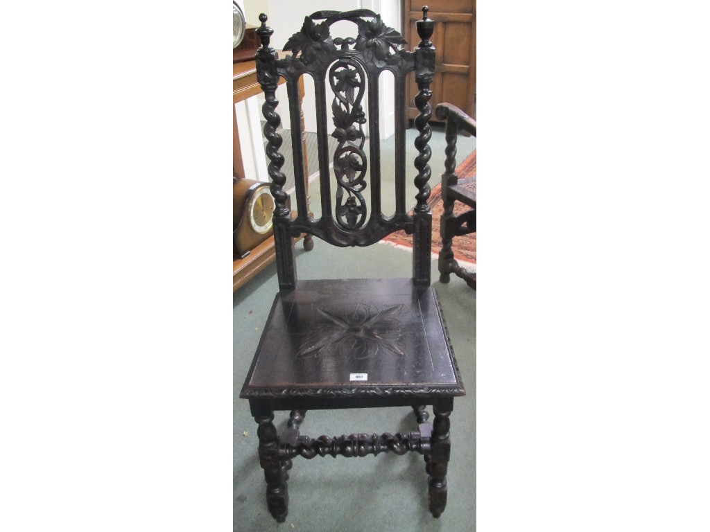 Appraisal: Carved oak hall chair