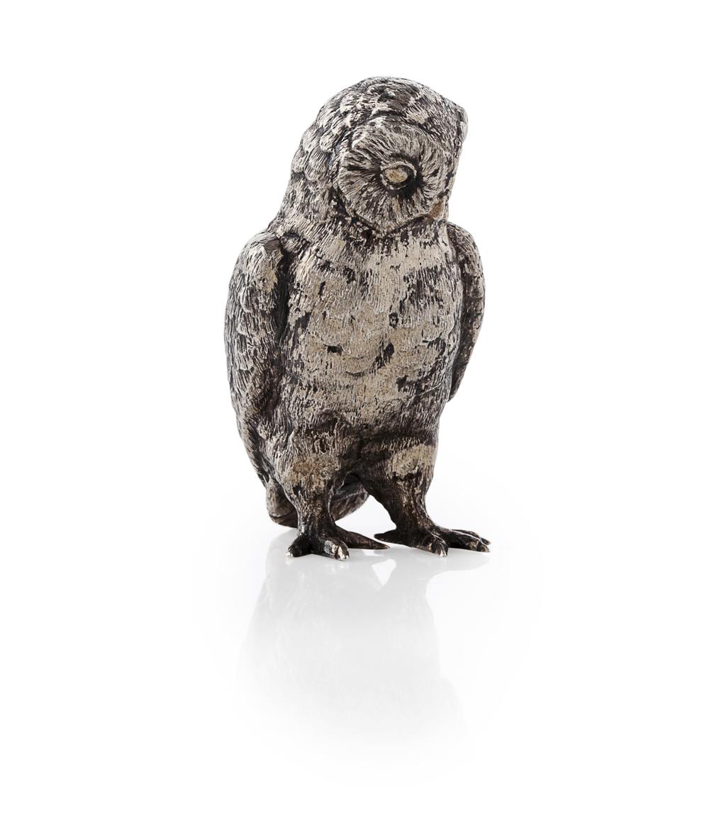 Appraisal: A cast silver model of an owl BSEP London standing