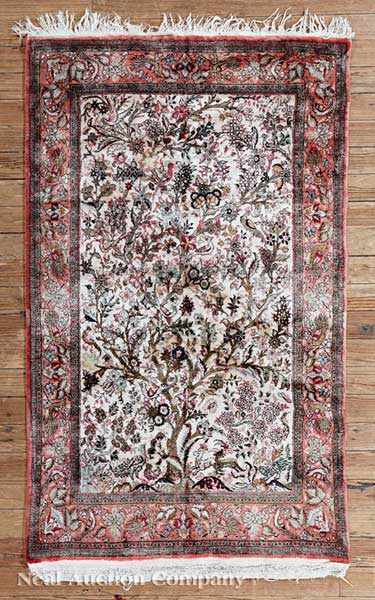 Appraisal: A Qum Silk Carpet cream and crimson ground central tree