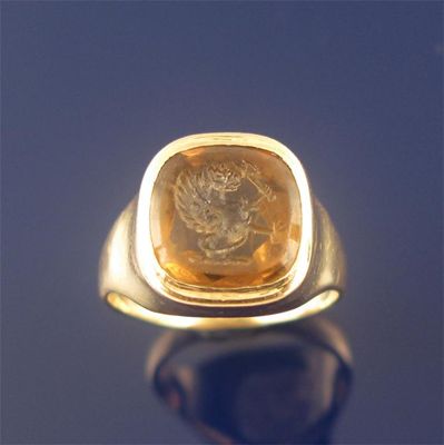 Appraisal: A lady's signet ring the citrine is engraved with a