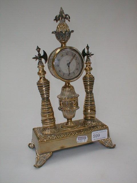 Appraisal: A gilt brass table clock high