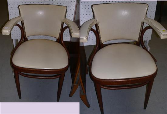 Appraisal: Pair Thonet tacked cream vinyl upholstered bentwood chairs some round