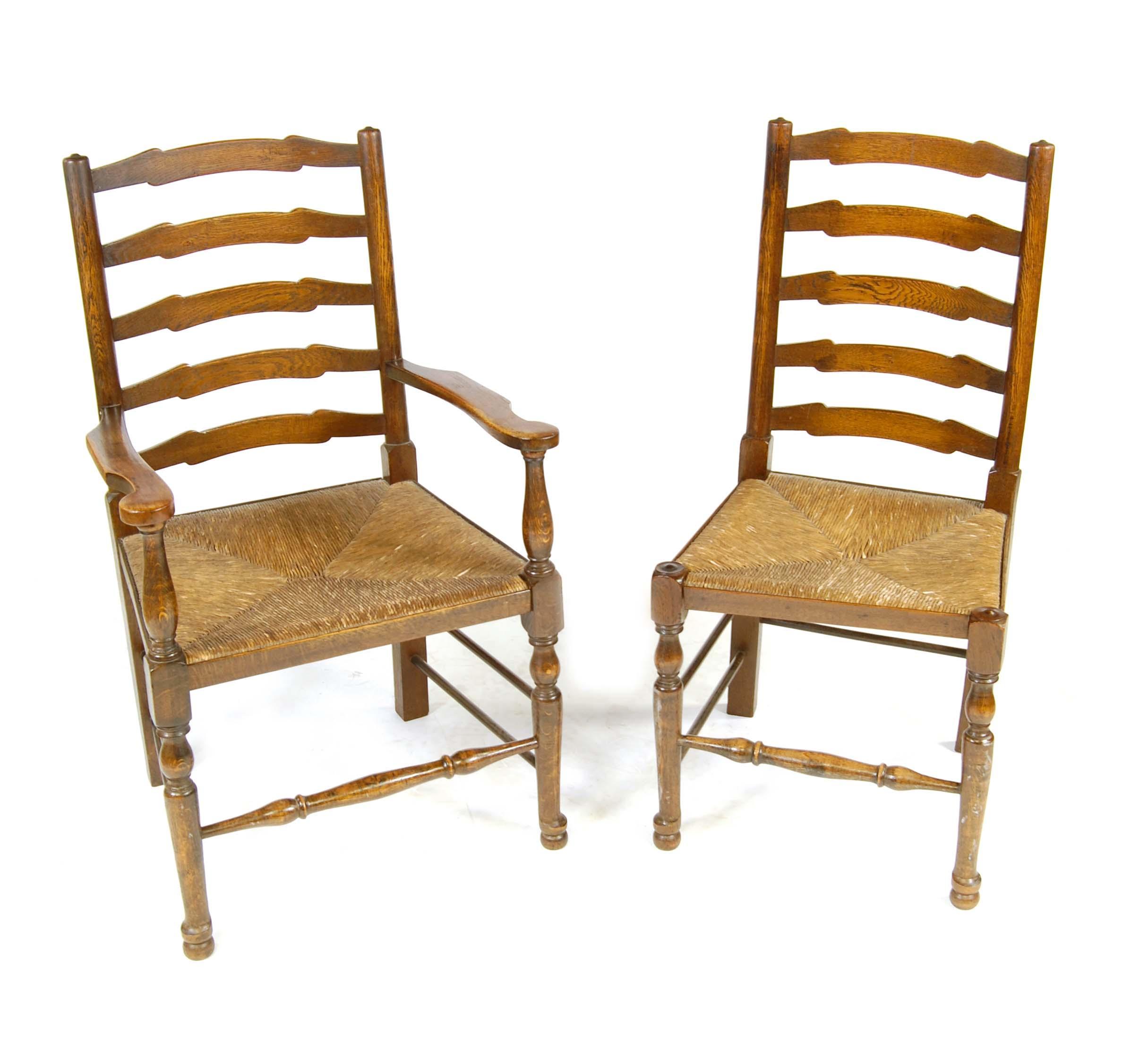 Appraisal: A set of six oak ladderback chairs