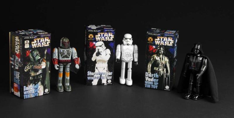 Appraisal: Lot of Tin Star Wars Wind-Up Toys Description Japanese Made