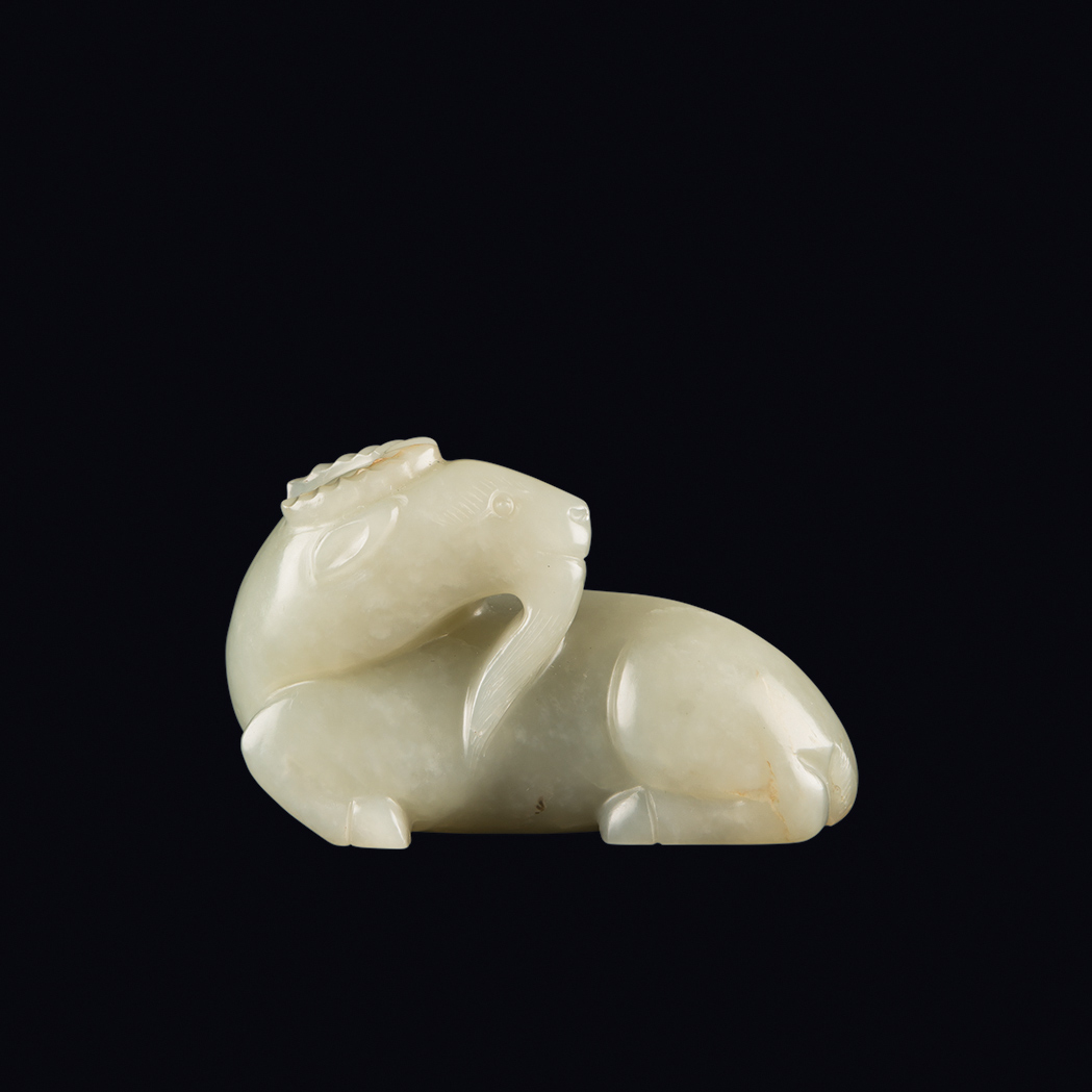 Appraisal: Chinese White Jade Ram Qing Dynasty Modeled recumbent with its