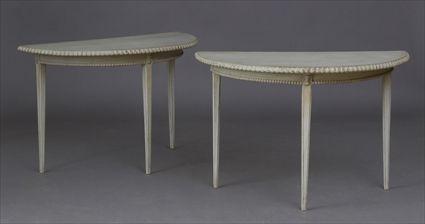 Appraisal: PAIR OF CONTINENTAL PAINTED DEMILUNE CONSOLE TABLES Each with beaded