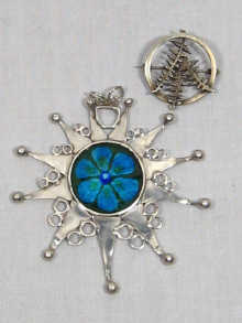 Appraisal: A silver enamel pendant hallmarked Edinburgh together with an Edinburgh