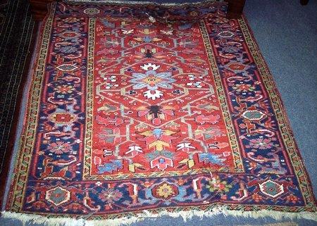 Appraisal: A th Century Persian rug with central medallion on a