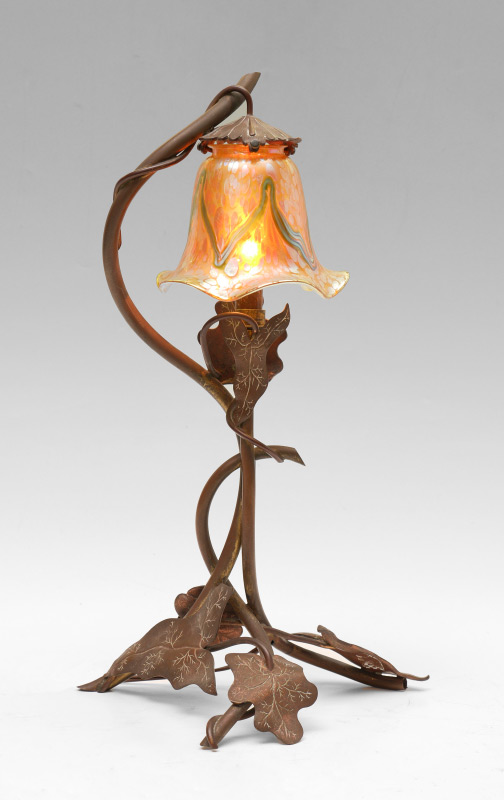 Appraisal: COPPER ART NOUVEAU LAMP WITH BOHEMIAN GLASS SHADE Foliate motif