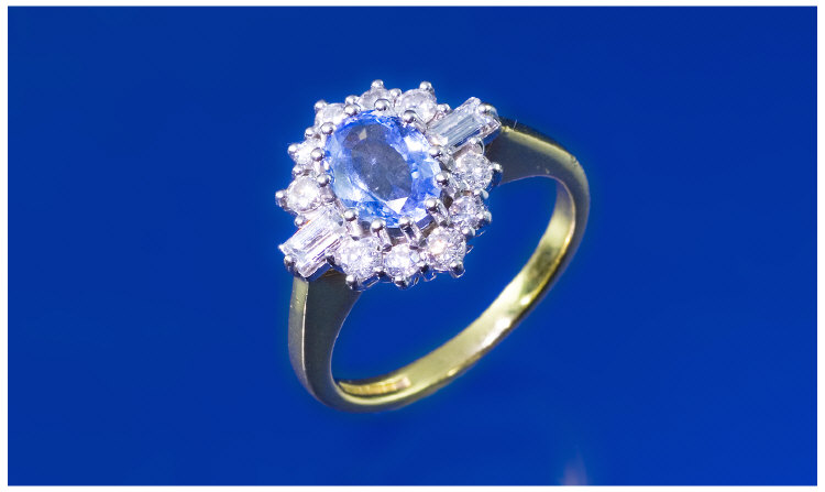 Appraisal: ct Gold Sapphire And Diamond Cluster Ring Central Oval Sapphire