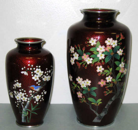 Appraisal: TWO JAPANESE CLOISONNE VASES Each baluster deep red ginbari foil