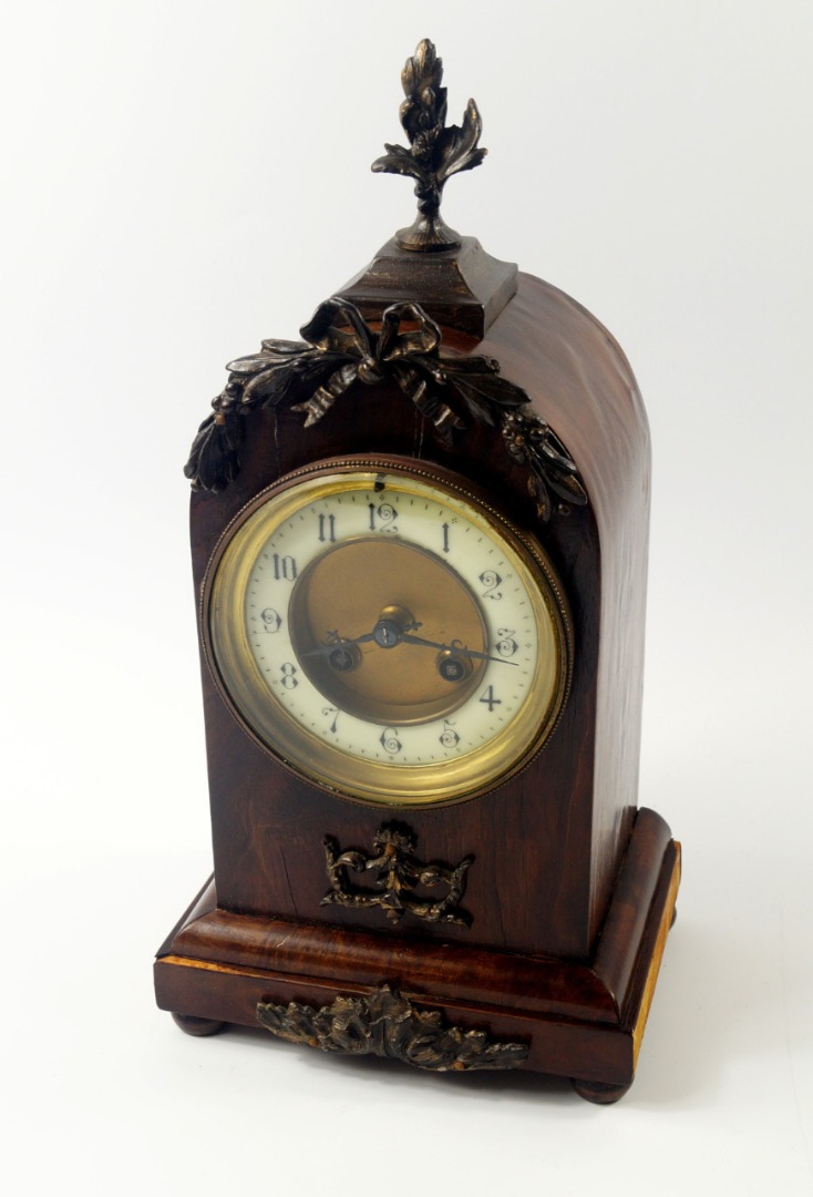 Appraisal: A French late thC walnut and brass mounted mantel clock