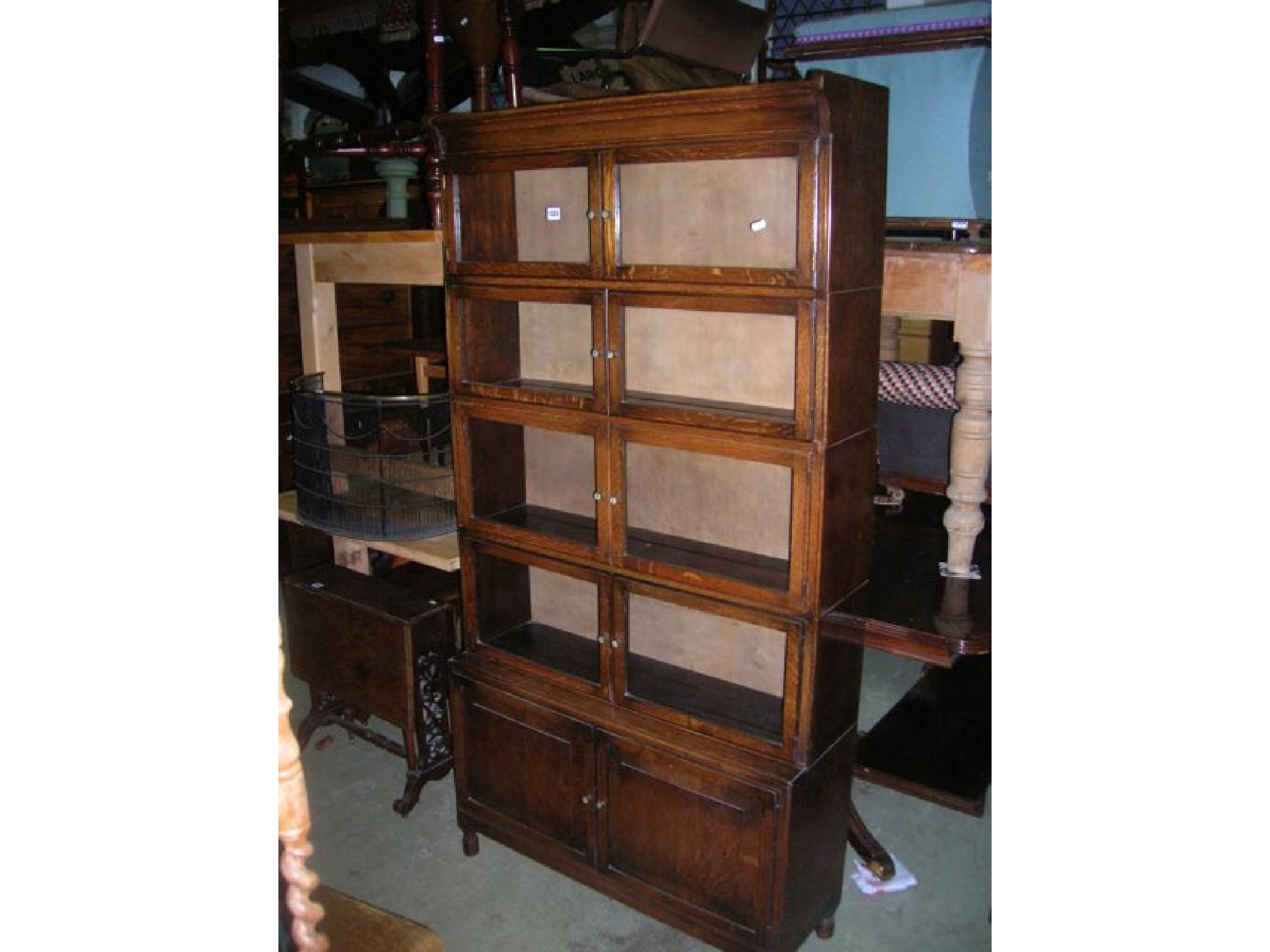 Appraisal: A Minty oak floorstanding five sectional stacking bookcase each section