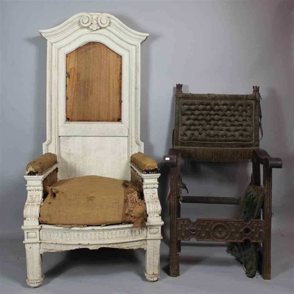 Appraisal: A SPANISH BAROQUE WALNUT ARMCHAIR th century with green tufted