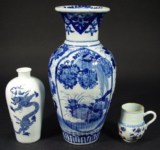 Appraisal: Two oriental porcelain vases painted in blues one with a