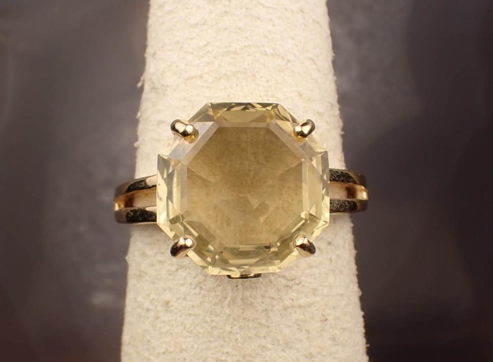 Appraisal: CITRINE AND FOURTEEN KARAT GOLD RING The yellow gold ring