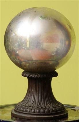 Appraisal: MERCURY GLASS GAZING BALL ON STAND The patinated composition stand