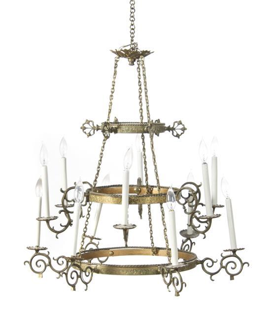 Appraisal: Renaissance Revival Three-Tier Chandelier the concentric tiers each with engraved