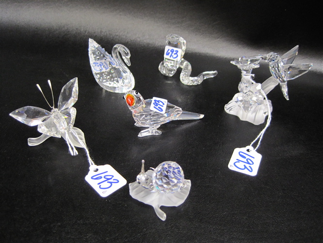 Appraisal: SIX SWAROVSKI AUSTRIAN CUT CRYSTALS hummingbird on flowers H cobra