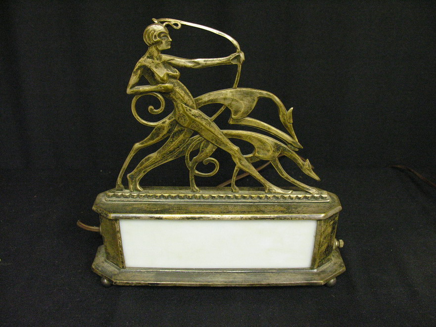 Appraisal: ART DECO NUDE GREYHOUND LAMP Silver plate Double sided Condition