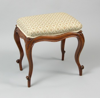 Appraisal: A Carved Walnut and Upholstered Bench A carved walnut bench