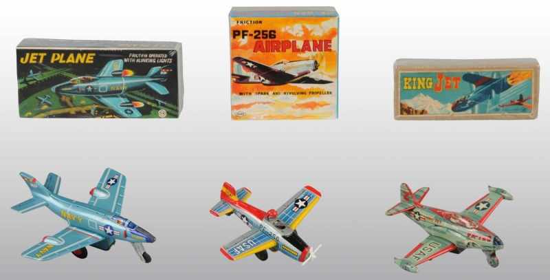 Appraisal: Lot of Tin Airplane Friction Toys Description Japanese Working Includes