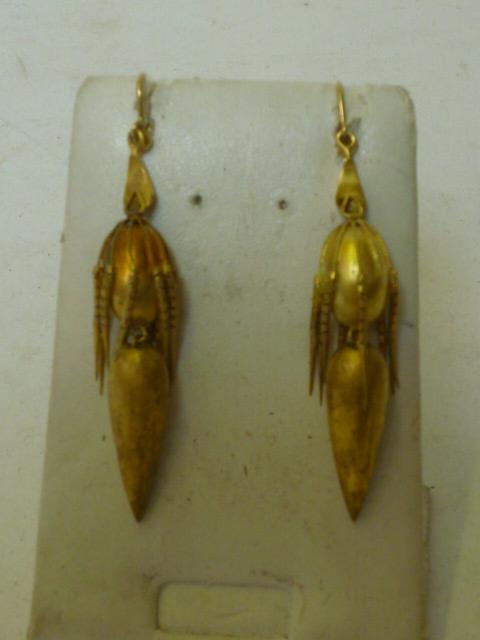 Appraisal: A PAIR OF VICTORIAN EAR PENDANTS of screw back form