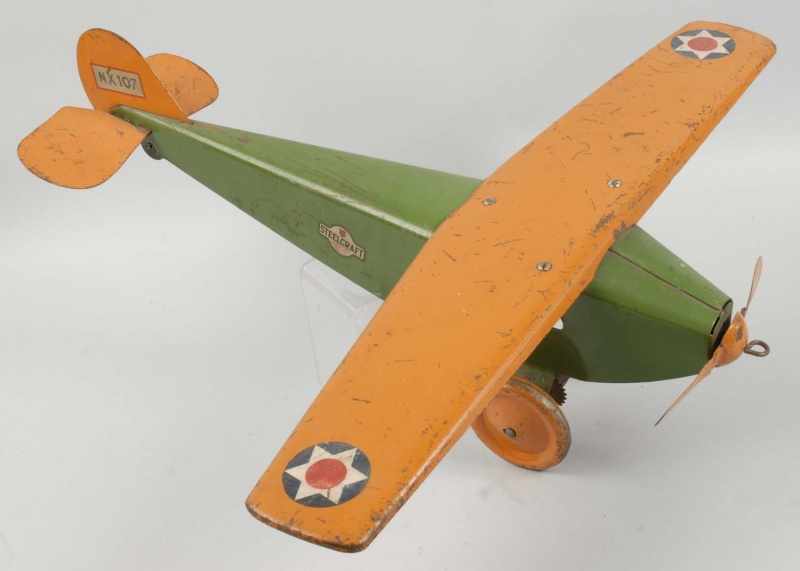 Appraisal: Pressed Steel Steelcraft Scout Airplane Toy Description Star decals on