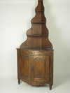 Appraisal: CORNER CUPBOARD - Country th C French part bow front