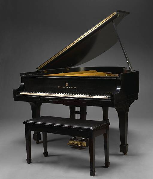 Appraisal: A Steinway and Sons black lacquer grand piano and stool