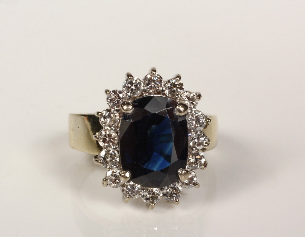 Appraisal: LADY'S RING - K Yellow Gold Platinum Oval Sapphire and