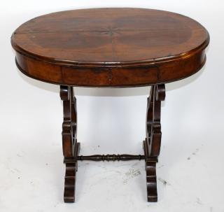 Appraisal: Oval side table with compass rose on shaped stretcher h