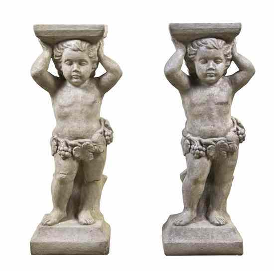 Appraisal: A Pair of Cast Stone Figural Pedestals each with a