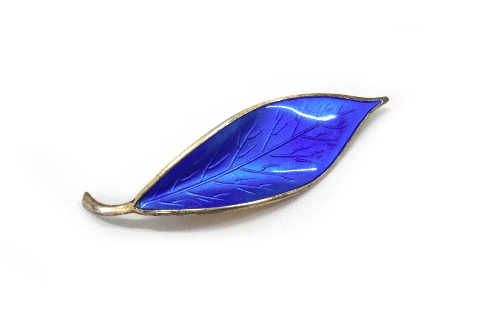 Appraisal: A David Andersen silver and blue enamel leaf brooch detailed