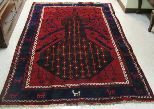 Appraisal: PERSIAN SHIRAZ CARPET Fars province southwest Iran the plain red