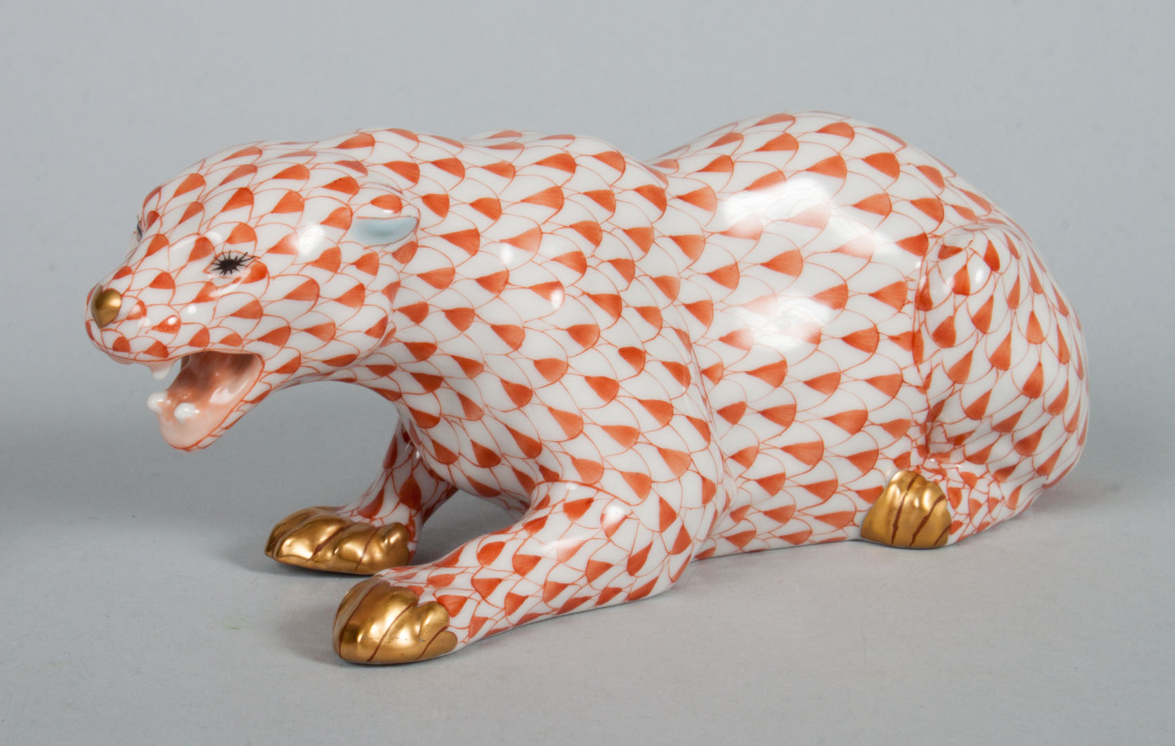 Appraisal: Herend porcelain crouching panther in the Rust Fishnet pattern in