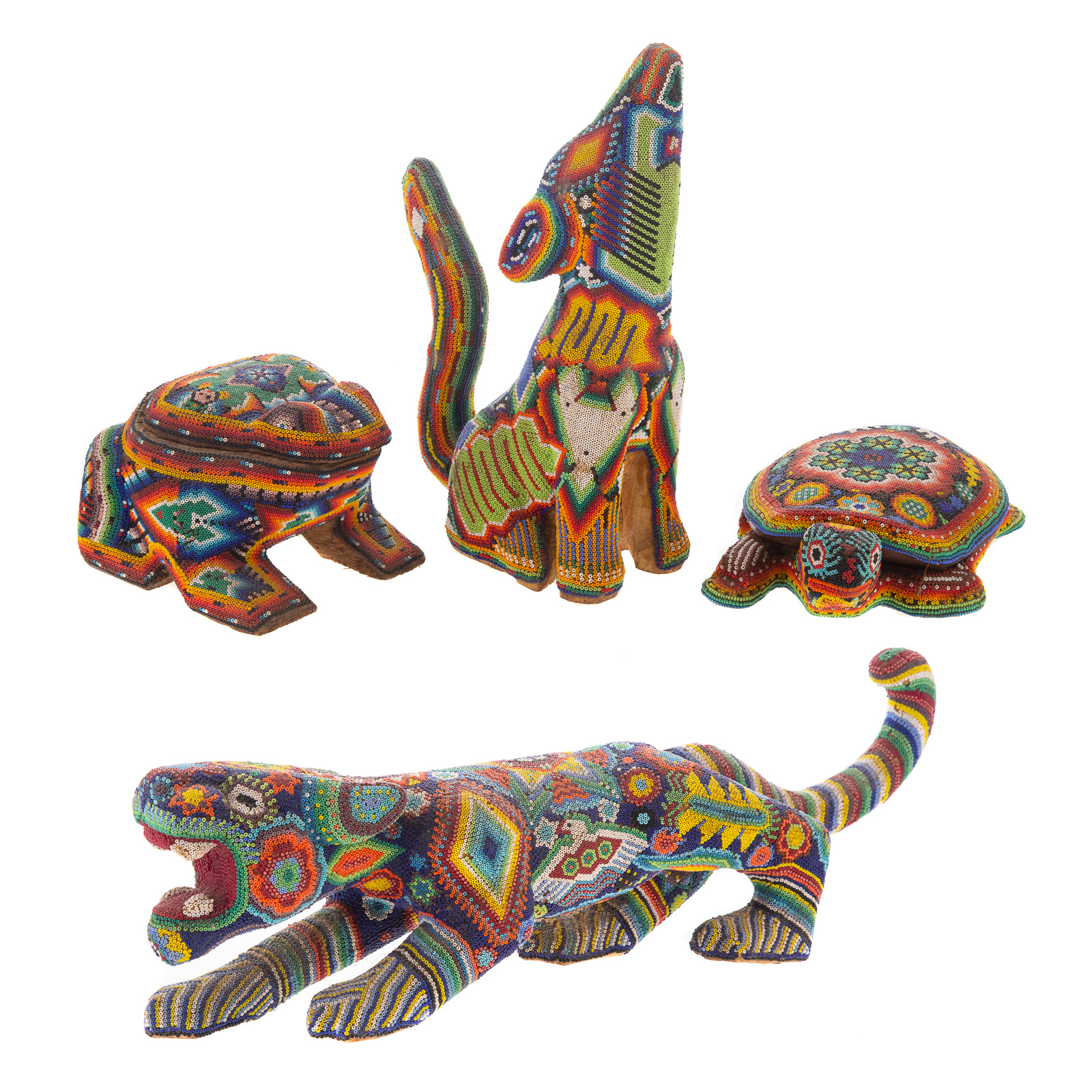 Appraisal: FOUR MEXICAN HUICHOL ANIMALS th century carved wood body with