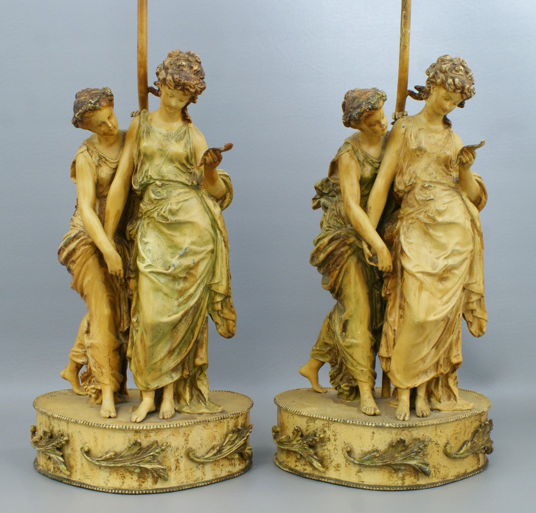 Appraisal: Pr painted white metal figural table lamps each with women