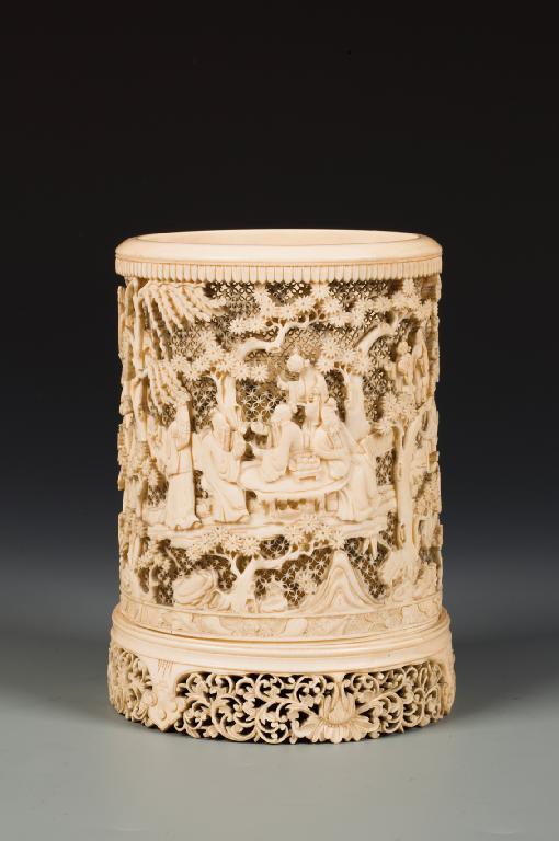 Appraisal: A CHINESE IVORY BRUSHPOT with a reticulated body finely carved