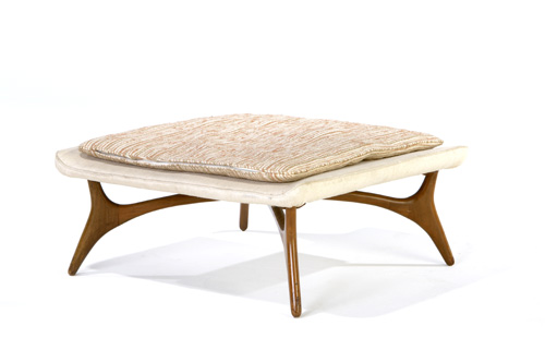 Appraisal: VLADIMIR KAGAN Ottoman upholstered in oatmeal colored fabric on walnut